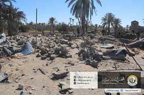 In this picture released online by the Sabratha Municipal Council on Friday, Feb. 19, 2016 shows the site where U.S. American warplanes struck an Islamic State training camp in Sabratha, Libya near the Tunisian border. ATunisian described as a key extremist operative probably was killed, the Pentagon announced. In Libya, local officials estimated that more than 40 people were killed with more wounded, some critically. (Sabratha Municipal Council via AP) MANDATORY CREDIT