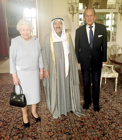 NORFOLK: HH the Amir Sheikh Sabah Al-Ahmad Al-Jaber Al-Sabah meets Queen Elizabeth and Duke of Edinburgh Prince Philip at Sandringham House yesterday. — KUNA