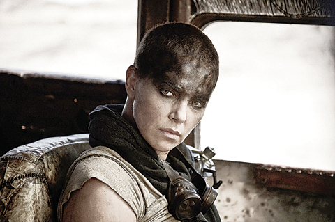 This photo provided by Warner Bros. Pictures shows Charlize Theron as Imperator Furiosa in Warner Bros Pictures’ and Village Roadshow Pictures’ action adventure film, “Mad Max: Fury Road”.