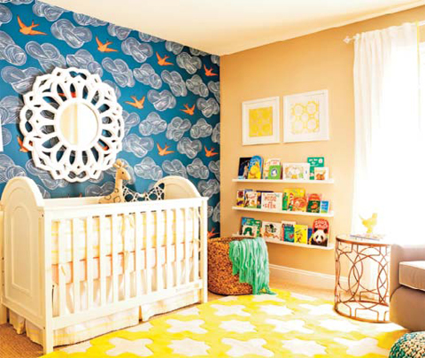 In this photo provided by J and J Design Group, bold pops of color and playful details make for nurseries and children’s rooms that are stylish and sophisticated