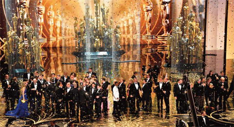 Oscar winners celebrate on stage at the 88th Oscars on Sunday in Hollywood, California.