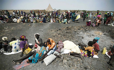 THONYOR, South Sudan: A large number of people wait for food air-drops by ICRC (International Committee of the Red Cross).— AFP