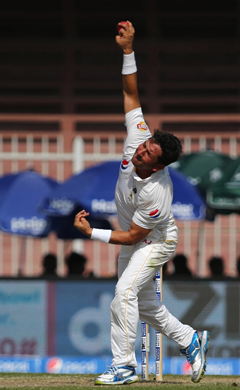 This file photo taken on November 5, 2015 shows Pakistan's Yasir Shah delivering a ball during the fifth and last day of the third cricket Test match between Pakistan and England at The Sharjah Cricket Stadium in the Gulf Emirate of Sharjah.