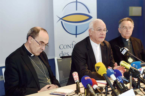 LOURDES, HAUTES-PYRENEES: Roman Catholic Cardinal Philippe Barbarin, Archbishop of Lyon (L) answers journalists’ questions next to Bishop of Pontoise for the Conference of Bishops of France Stanislas Lalanne (C) French Archbishop of Marseille and President of the Bishops’ Conference of France Georges Pontier (R). — AFP