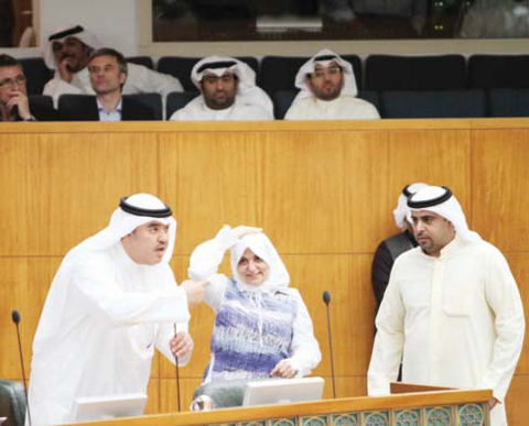 KUWAIT: Minister of Social Affairs and Labor and Planning Hind Al-Subaih gestures during a session at the National Assembly yesterday. — Photo by Yasser Al-Zayyat