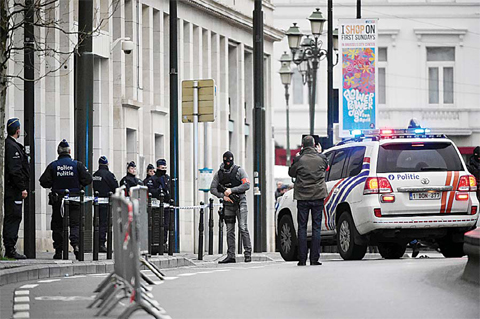 BRUSSELS: Police block the street outside the council chamber in Brussels, where two terrorism cases will be held behind closed doors. —AFP