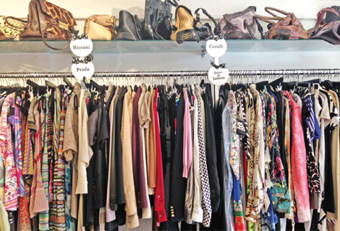 Blouses and purses on display at the Encore Plus consignment store in Boca Raton, Fla.