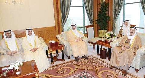 KUWAIT: HH the Amir Sheikh Sabah Al-Ahmad Al-Jaber Al-Sabah receives National Assembly Speaker Marzouq Al-Ghanem and chairmen of parliamentary committees yesterday. — KUNA