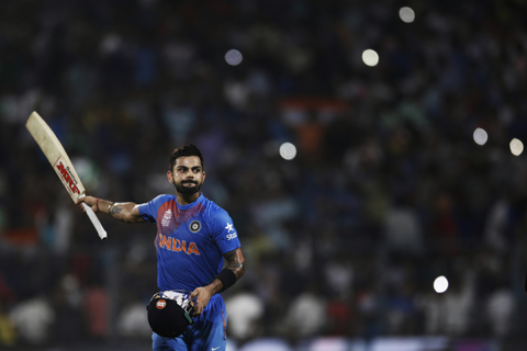 India's Virat Kohli celebrates his team victory  during the ICC World Twenty20 2016 cricket match against Pakistan at Eden Gardensnin Kolkata, India, Saturday, March 19, 2016.