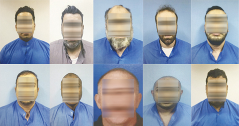 KUWAIT: This photo provided by the Interior Ministry shows members of a gang arrested for money laundry yesterday