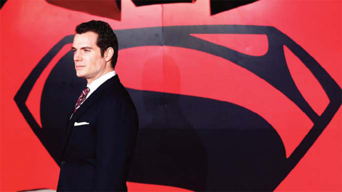 This file photo shows British actor Henry Cavill poses for a photograph after arriving to attend the European Premiere of the film ‘Batman v Superman: Dawn of Justice’, in central London. — AFP