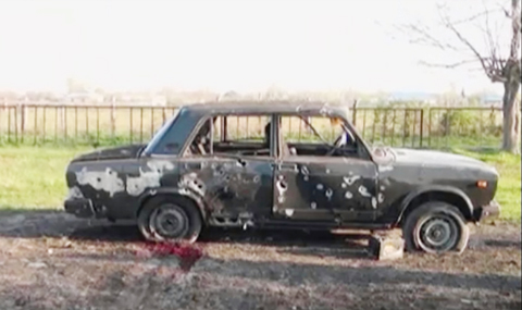 TERTER, Azerbaijan: In this image from TV, a car destroyed with blood is seen after heavy fighting erupted between Armenian and Azerbaijani forces over the separatist region of Nagorno-Karabakh. - AFP 