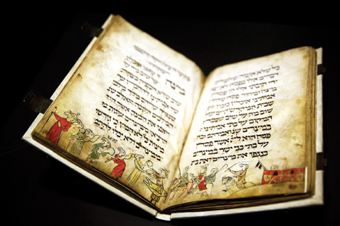 In this photo the famed Birds’ Head Haggadah, a medieval copy of a text read around the Passover holiday table, is seen on display at the Israel Museum in Jerusalem. — AP