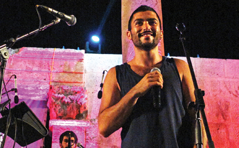 AMMAN: Hamed Sinno, 24, lead singer and song writer of the Lebanese group Mashrou’ Leila performs with the band in the ancient Roman amphitheater on Sept. 14, 2012.