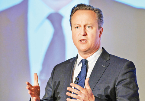 LONDON: Prime Minister David Cameron speaks at the Conservative party’s spring forum in central London. — AP