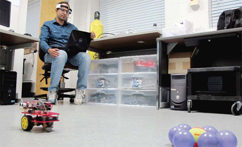 GAINESVILLE, Florida: In this April 15, 2016 photo, University of Florida PhD student Islam Badreldin, 31, practices driving a brain-controlled vehicle that he modified to work wirelessly. — AP
