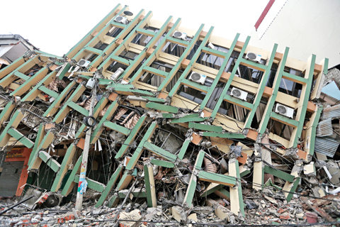 PORTOVIEJO, ECUADOR: View of a fallen building after a 7.8-magnitude quake yesterday. — AFP