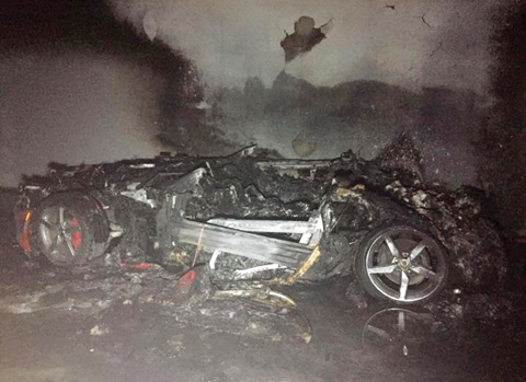 Remains of a car that was destroyed during a suspect’s botched escape from police in Maidan Hawally.