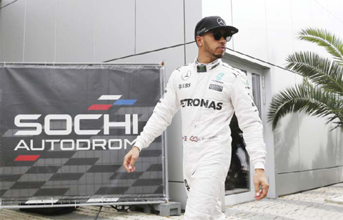 SOCHI: Mercedes driver Lewis Hamilton, of Britain, walks in the paddock after the qualifying session for today’s Formula One Russian Grand Prix at the Sochi Autodrom racetrack, in Sochi, Russia