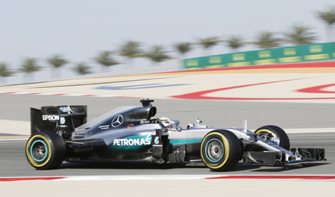 Mercedes driver Lewis Hamilton of Britain steers his car during the third free practice at the Formula One Bahrain International Circuit, in Sakhir, Bahrain, yesterday. The Bahrain Formula One Grand Prix will be held today. —AP