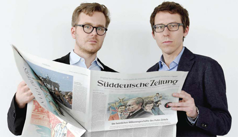 MUNICH: German journalists Frederik Obermaier (L) and Bastian Obermayer (R) co-authors of the so-called “Panama Papers” investigation pose at the office of the German daily “Sueddeutsche Zeitung”. — AFP