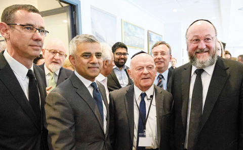 BARNET, NORTH LONDON: (L-R) Ambassador of Israel Mark Regev, The Mayor of London Sadiq Khan, Holocaust survivor Ben Helfgott and Chief Rabbi Ephraim Mirvis of the United Congregations of the Commonwealth pose for a photograph ahead of the Yom HaShoah Commemoration, the UK Jewish community’s Holocaust remembrance ceremony yesterday.—AFP