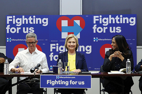 NEW YORK, NY - MAY 12: Democratic presidential front-runner Hillary Clinton speaks with a coalition of HIV/AIDS activists at her Brooklyn Campaign Headquarters on May 12, 2016 in New York City. Clinton spoke to the group about her commitment and history of ending AIDS as a global epidemic.   Spencer Platt/Getty Images/AFPn== FOR NEWSPAPERS, INTERNET, TELCOS &amp; TELEVISION USE ONLY ==