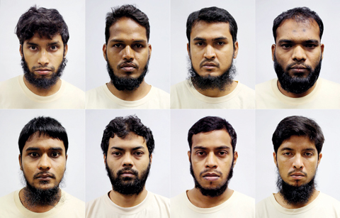 SINGAPORE: This undated photo shows eight detained Bangladeshi nationals (top row left to right) Islam Shariful, Md Jabath Kysar Haje Norul Islam Sowdagar, Sohag Ibrahim, Zzaman Daulat, (bottom row left to right) Sohel Hawlader Ismail Hawlader, Rahman Minazur, Miah Rubel, and Mamun Leakot Ali who were arrested for allegedly plotting terror attacks in their home country, in Singapore. — AFP