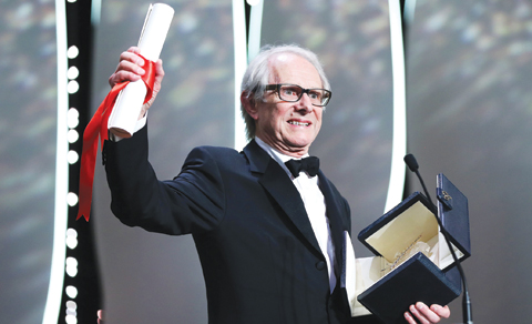 British director Ken Loach celebrates on stage after being awarded with the Palme d’Or for the film ‘I, Daniel Blake’.
