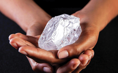 A Sotherby’s employee holds Lesedi La Rona Diamond on Tuesday 3, 2016 in New York City. — AP