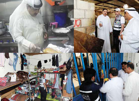 KUWAIT: Environment police, Environment Public Authority (EPA) and municipality inspectors yesterday raided a sheep pen in Rai that was used as a slaughterhouse without a license. Officials said following the operation that the pen’s owner was going to be summoned for questioning. — Photos By Fouad Al-Shaikh