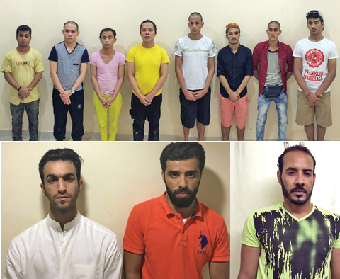 This handout photo shows eight person that police said they arrested inside a massage parlor where homosexual activities were being practiced.  (Left) Two other suspects arrested yesterday on charges of engaging in homosexual activities in Kuwait.(Right) A third suspect arrested yesterday on the same charges