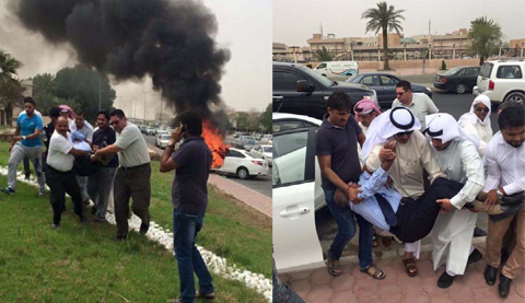 KUWAIT: MP Majed Mousa and others help Louis Rajan out of his wrecked vehicle following an accident near Andalus yesterday.