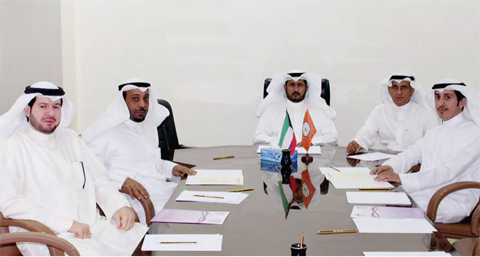 KUWAIT: The Kuwait Trade Union Federation Chairman Salem Al-Ajmi (center) attends the signing ceremony