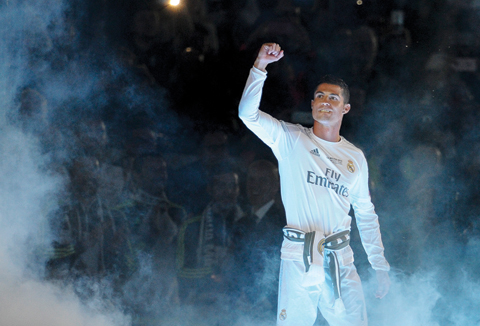 MADRID: Real Madrid’s Portuguese forward Cristiano Ronaldo acknowledges supporters during Real celebrations for their 11th UEFA Champions Cup at the Santiago Bernabeu stadium . — AFP