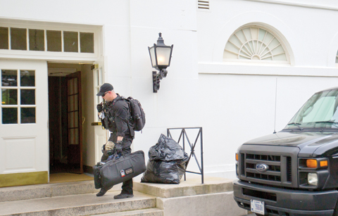 ASHINGTON: A member of the US Secret Service Counter Assault Team is seen entering the White House in Washington after accompanying President Barack Obama’s motorcade back from Andrews Air Force Base. — AP