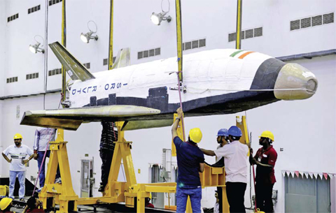 SRIHARIKOTA: The Indian Space Research Organization (ISRO)yesterday shows a scale version of a “Reusable Launch Vehicle” or RLV-TD as it is readied for launch from Sriharikota on the south-east coast of India yesterday. — AFP