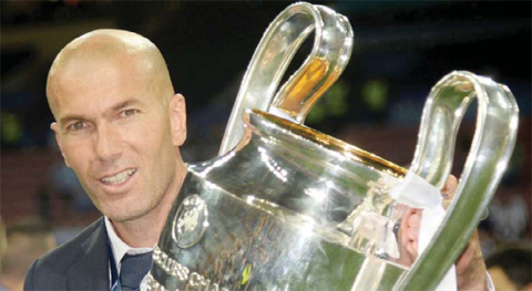 MILAN: Real Madrid’s French coach Zinedine Zidane poses with the trophy after Real Madrid won the UEFA Champions League final football match between Real Madrid and Atletico Madrid at San Siro Stadium. — AFP