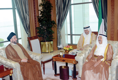 KUWAIT: His Highness the Amir Sheikh Sabah Al-Ahmad Al-Jaber Al-Sabah meets with President of the Islamic Supreme Council of Iraq Ammar Al-Hakim. — Amiri Diwan and KUNA photos