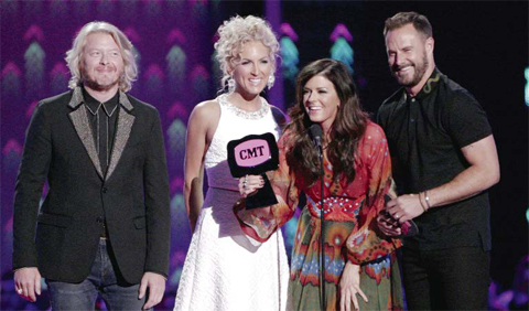 (From left) Phillip Sweet, Kimberly Roads Schlapman, Karen Fairchild and Jimi Westbrook accept the award for group/duo video of the year for “Girl Crush”.