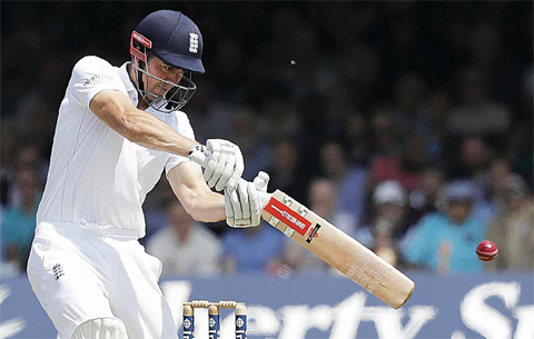 LONDON: England batsman Alastair Cook plays a shot during the first day of the third Investec Test Match between England and Sri Lanka at Lord’s cricket ground. —AFP