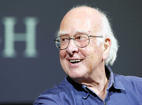 FILE - In this file photo dated Friday, Oct. 11, 2013, Britain's Professor Peter Higgs smiles during a press conference in Edinburgh, Scotland, Friday, Oct. 11, 2013.  A group of 13 Nobel laureates, including Peter Higgs, have written an open letter published in a British national newspaper Saturday June 11, 2016, urging U.K. referendum voters to remain inside the European Union, warning that Britain will lose funding, global influence and access to expertise if the nation votes to leave the 28-nation bloc.(AP Photo/Scott Heppell, FILE)