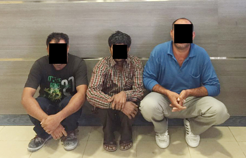 This photo released by the Interior Ministry shows three persons arrested yesterday for eating and drinking in public during Ramadan; a criminal offense in Kuwait