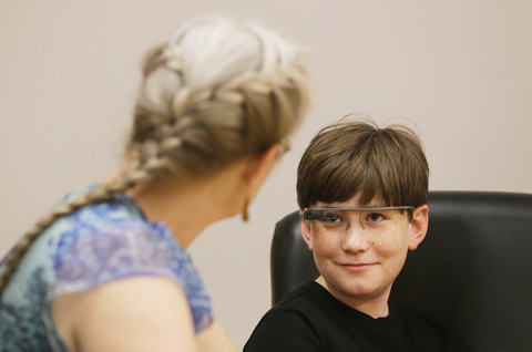 STANFORD, California: Julian Brown talks with his mother Kristen during a meeting with Jena Daniels, a clinical research coordinator at The Wall Lab, on June 22, 2016. — AP