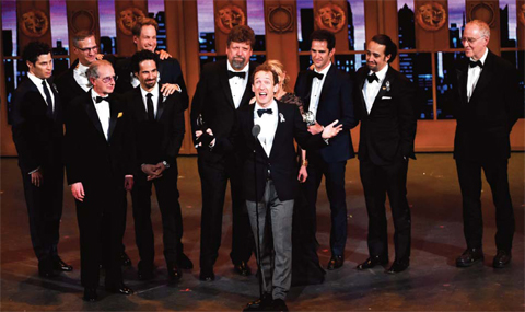 Producer of “Hamilton” Jeffrey Seller and cast accepts the award for best musical at the Tony Awards at the Beacon Theatre on Sunday. — AP/AFP photos