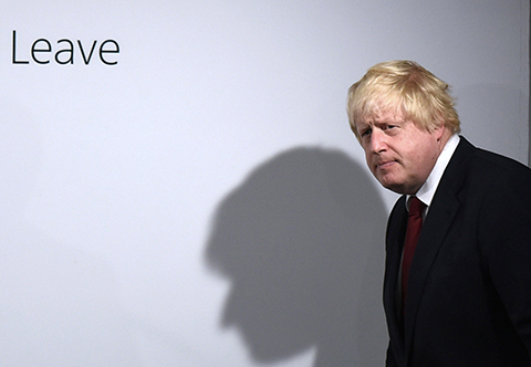 Vote Leave campaigner Boris Johnson arrives for  a press conference at Vote Leave headquarters  in London Friday June 24, 2016.  Britain's Prime Minister David Cameron announced Friday  that he will quit as Prime Minister following a defeat in the referendum which ended with a vote for Britain to leave the European Union. (Mary Turner/Pool via AP)