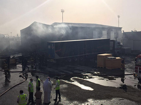KUWAIT: Massive fires engulfed the Kuwait Airport cargo store yesterday. Firemen from the Kuwait Fire Service Directorate (KFSD) battled the blaze. — KUNA