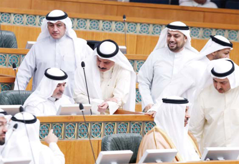 KUWAIT: Kuwaiti MPs take part in a parliamentary session at the National Assembly in Kuwait City yesterday. — Photo by Yasser Al-Zayyat