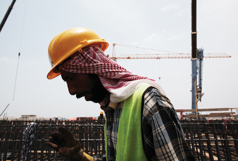 JEDDAH: A man works at a construction site in Jeddah, Saudi Arabia. - AP 