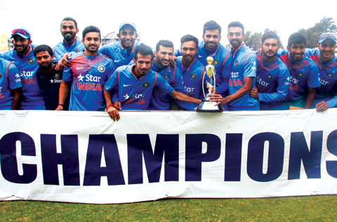 HARARE: India’s players pose with the Prayag Series Trophy after winning the third and final T20 cricket match in a series of three games between India and Zimbabwe in the Prayag Cup at Harare Sports Club, in Harare, yesterday. — AFP